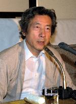 Koizumi pledges to reform public sector to spur economy
